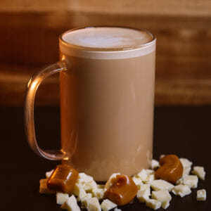 Image of Ellianos Coffee's Quality Hand-Crafted Caffe Dolce Signature Drink. Enjoy the luxurious life with this treat. Decadent white chocolate mingles with creamy caramel, smooth espresso, and creamy milk.