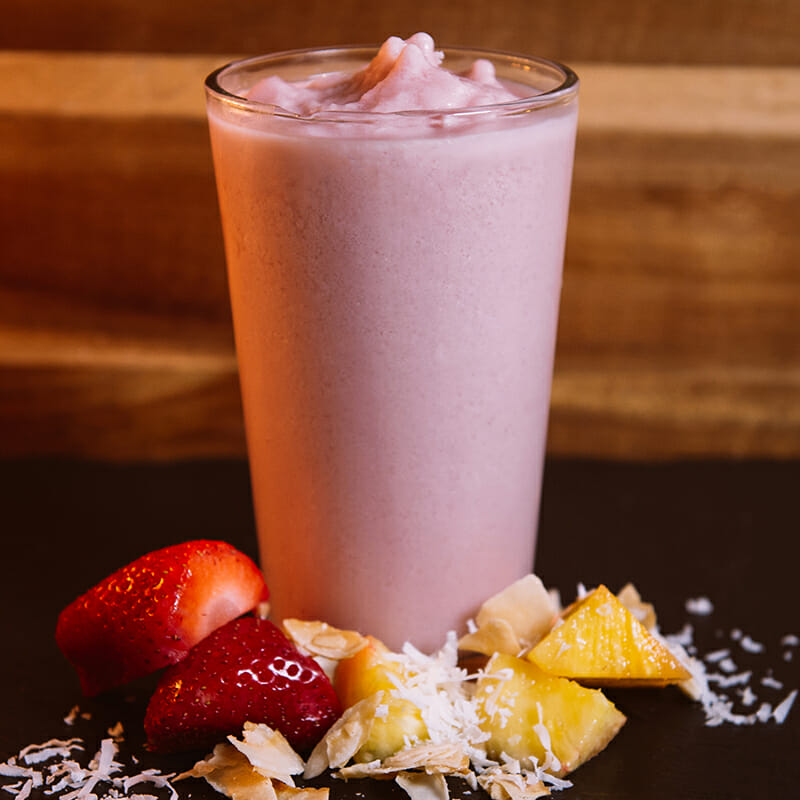 Image of Ellianos Coffee's signature smoothie, the Sicilian. A smooth blend of sweet strawberries, tangy pineapple, and fruity coconut.