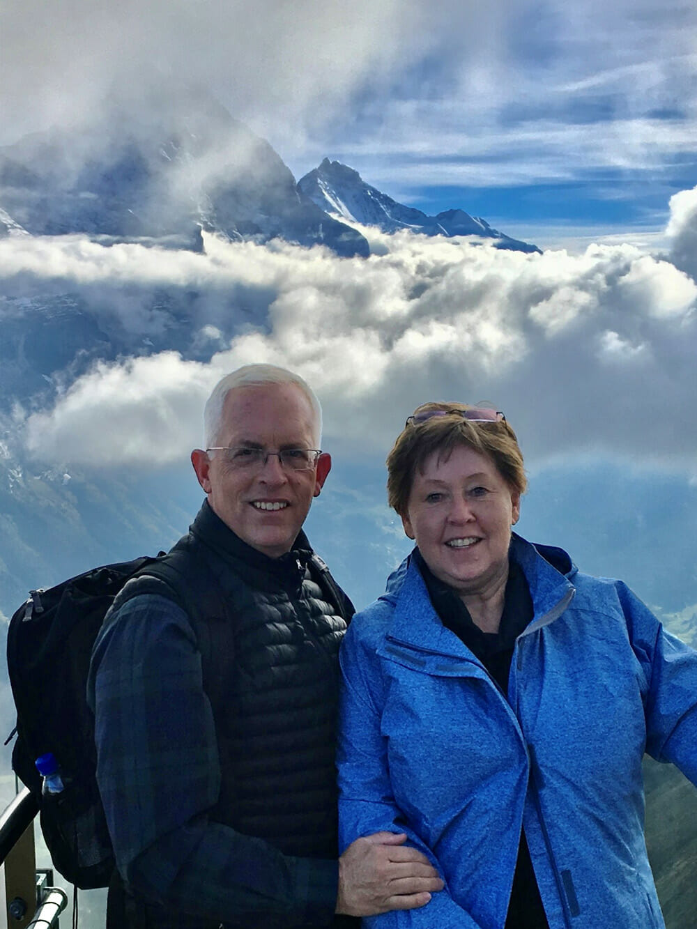 Jim Zuber in the mountains with his wife.