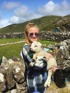 Samantha Leis with a baby goat