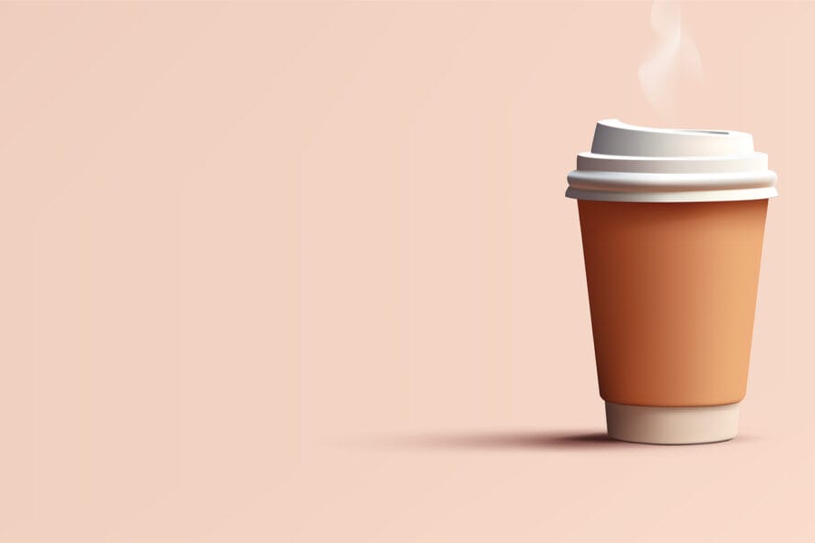 Steaming cup of to go coffee